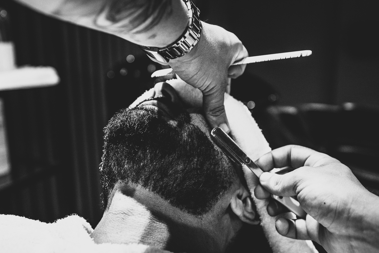 Barber cutting hair